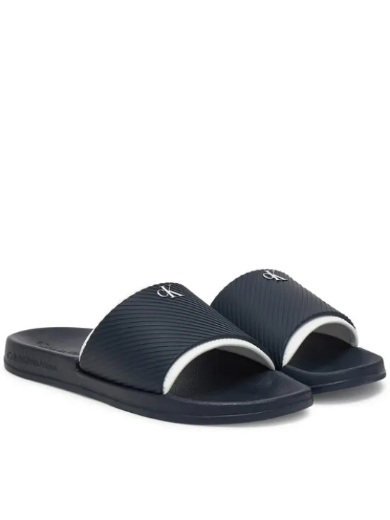 Calvin Klein Jeans Klapki Slide Rubber Neoprene Text YM0YM01234 Granatowy