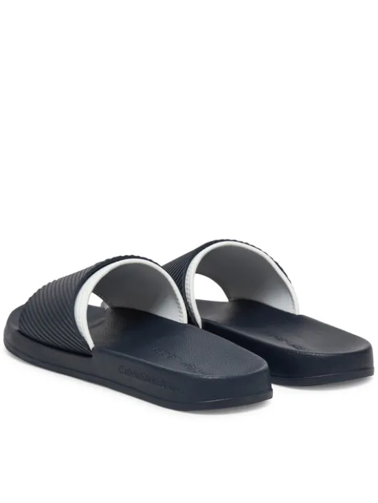 Calvin Klein Jeans Klapki Slide Rubber Neoprene Text YM0YM01234 Granatowy