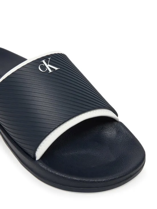 Calvin Klein Jeans Klapki Slide Rubber Neoprene Text YM0YM01234 Granatowy