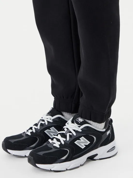Champion Spodnie dresowe 117872 Czarny Slim Fit