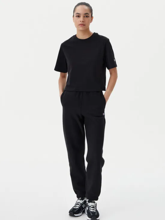 Champion Spodnie dresowe 117872 Czarny Slim Fit
