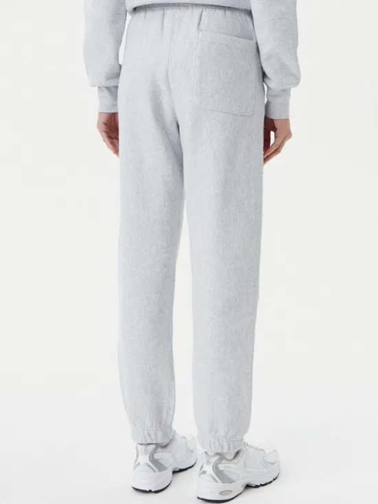 Champion Spodnie dresowe 117872 Szary Slim Fit