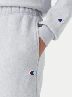 Champion Spodnie dresowe 117872 Szary Slim Fit