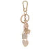 Guess Brelok RW7571 P6301 Złoty
