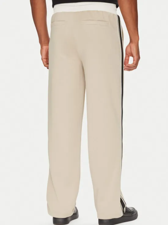 Guess Spodnie dresowe Z5YB14 KCRU2 Beżowy Regular Fit