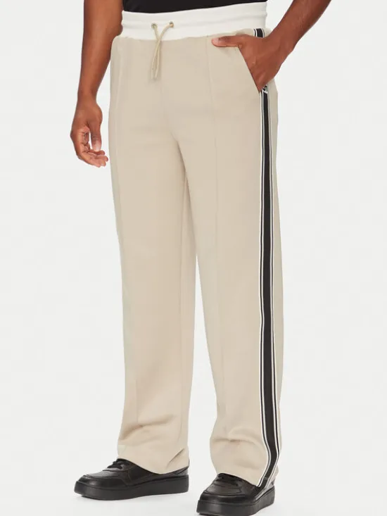 Guess Spodnie dresowe Z5YB14 KCRU2 Beżowy Regular Fit