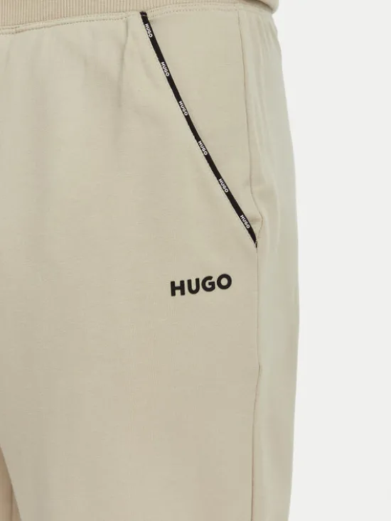 HUGO Spodnie dresowe Noah 50566158 Beżowy Regular Fit
