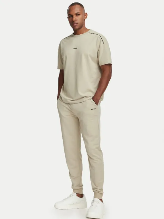 HUGO Spodnie dresowe Noah 50566158 Beżowy Regular Fit