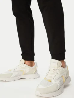 Lacoste Spodnie dresowe XH9833 Czarny Regular Fit