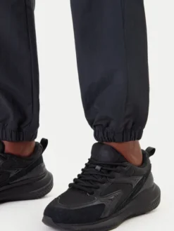 Reebok Spodnie dresowe Vector 100221435 Czarny Relaxed Fit