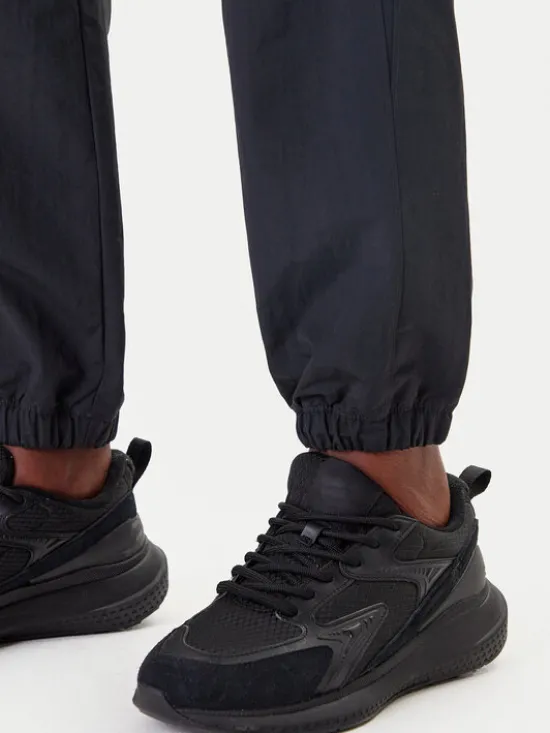 Reebok Spodnie dresowe Vector 100221435 Czarny Relaxed Fit