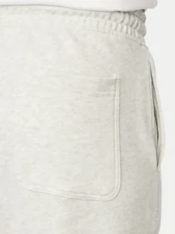 Tommy Jeans Spodnie dresowe DM0DM23593 Szary jasny Regular Fit