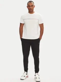 Tommy Jeans Spodnie dresowe Flag DM0DM20473 Czarny Slim Fit