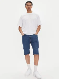Tommy Jeans Szorty jeansowe Ryan DM0DM21851 Niebieski Slim Fit