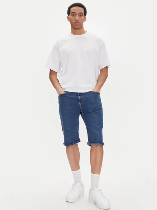 Tommy Jeans Szorty jeansowe Ryan DM0DM21851 Niebieski Slim Fit